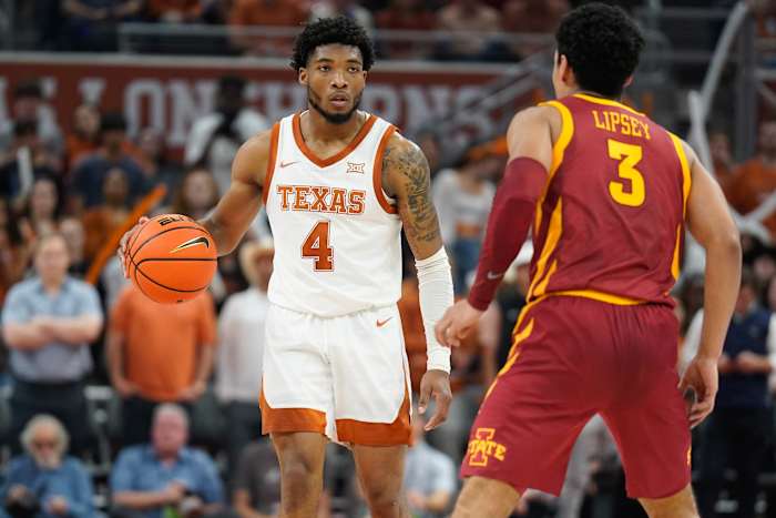Texas Longhorns guard Tyrese Hunter (4) and Iowa State Cyclones guard Tamin Lipsey (3) during the first half at Moody Center.